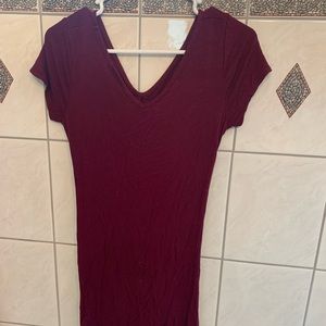 Short sleeve maroon dress. Knee length with scrunched back. Worn once.